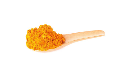 Turmeric powder on a wooden spoon on white background