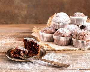 Homemade chocolate muffins on the kitchen table