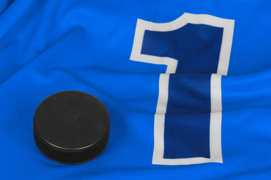 Blue hockey sweater and washer