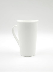 white cup on white background