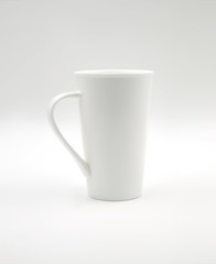 white cup on white background