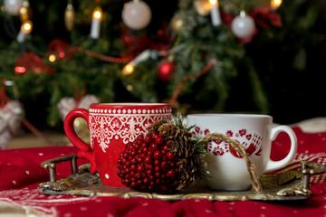 Obraz na płótnie Canvas Cup with Christmas ornament