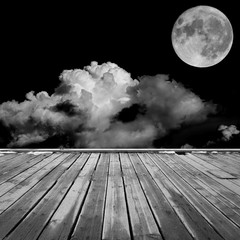 Naklejka na ściany i meble Wood table top on sky at night with beautiful full moon backgrou
