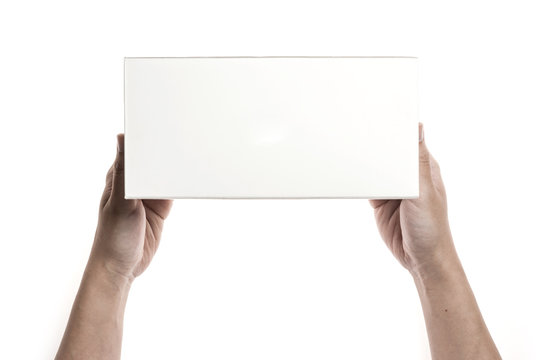 Two hands hold a empty(blank) white gift box isolated white