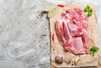 fresh raw meat on the paper. Free space for text . Top view