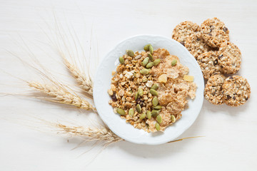 oatmeal cookies and muesli on a table, selective focus, the top view