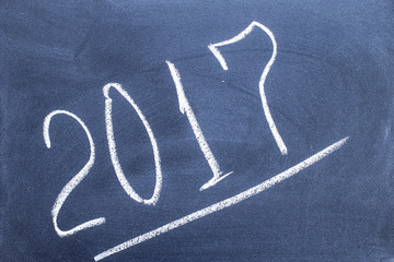Year number 2017 written  on the blackboard