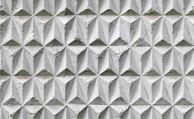 Seamless texture of concrete light gray cellular fence. Rough grunge uneven surface.