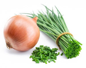 Green onions and bulb onion isolated on the white background.