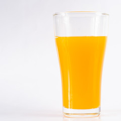 Orange juice in glass white background