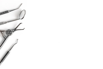 dental tools on white background top view