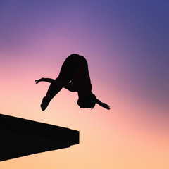 Silhouette of lady diver