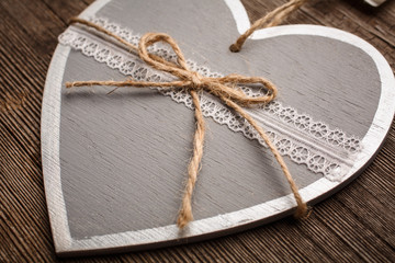 Fototapeta na wymiar vintage heart decoration on Wooden background