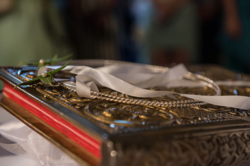 bible with silver rings