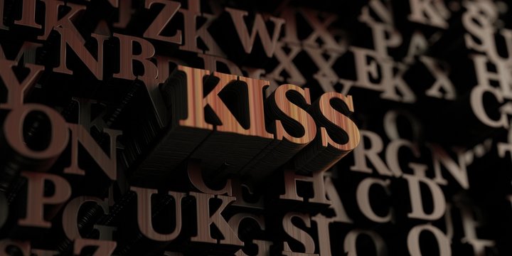 Kiss - Wooden 3D rendered letters/message.  Can be used for an online banner ad or a print postcard.