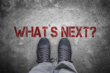 What`s next? stencil print with sneakers on concrete floor 