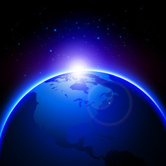Blue globe earth with light flare over sky background.