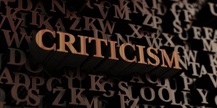 Criticism - Wooden 3D rendered letters/message.  Can be used for an online banner ad or a print postcard.