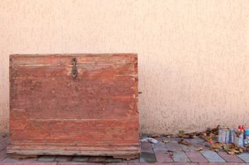 antique chest against the wall.