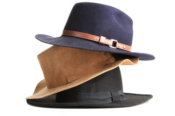 Stack of hats isolated on white background