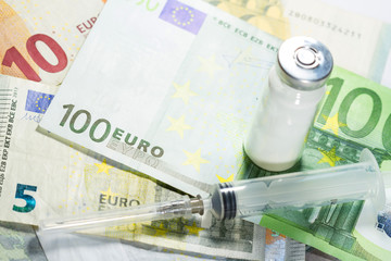 Euro banknotes with medical instruments