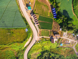 Aerial view of crooked path of road on the mountain, Shot from d
