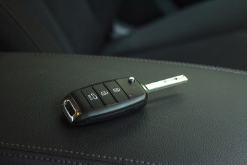 Car remote control key in vehicle interior