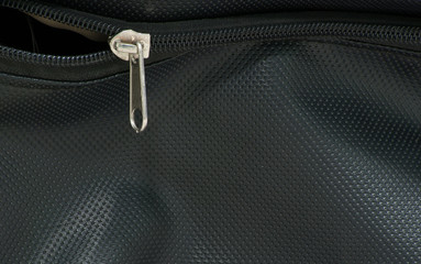 zipper on black bags texture background