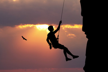 man climbs