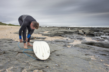 Surfer preparing to surf