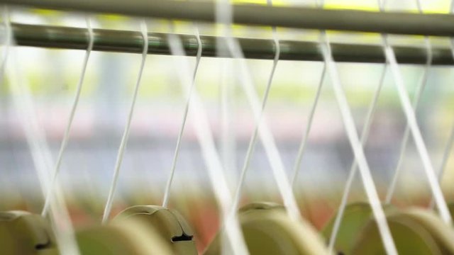 Прядильная фабрика. Производства тканей,  шелка,  льна,  синтетики, ниток. Автоматизированный процесс. 