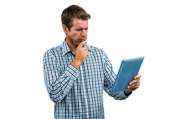 Portrait of happy man using tablet