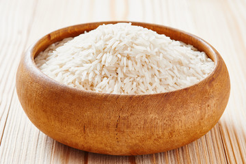 Basmati rice and brown rice on spoon