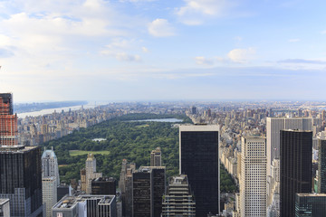 Fototapeta na wymiar Central Park aerial view, Manhattan, New York; Park is surrounded by skyscraper