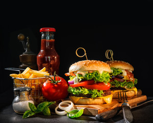 Delicious hamburgers with french fries
