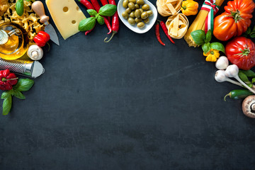 Italian food ingredients on slate background
