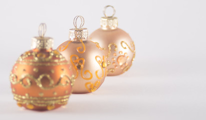 Three Gold Christmas Baubles