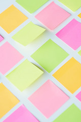 Plenty of adhesive notes sticked on the table