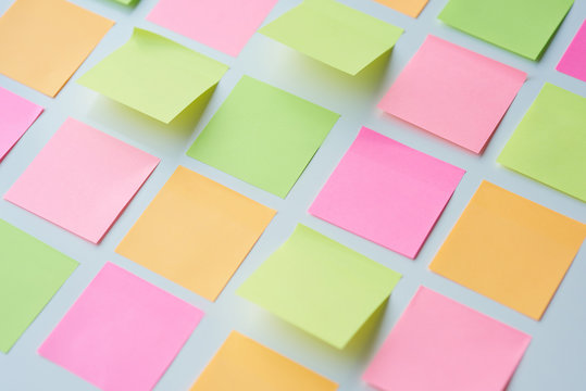 Empty sticky notes put on the table . © gpointstudio