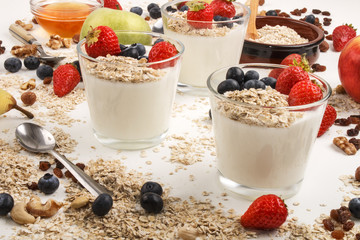 healthy breakfast with yoghurt, fruit and oatmeal