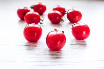 cherry on wooden white table