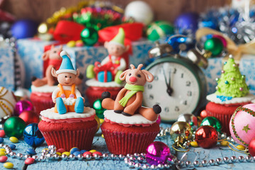 Christmas cupcakes with colored decorations