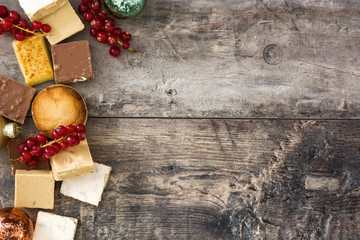 Christmas nougat on wooden background.Copyspace
