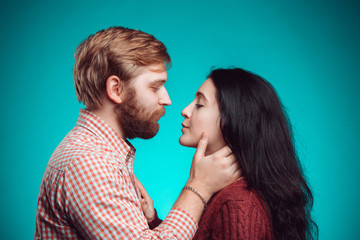 Young man and woman kissing