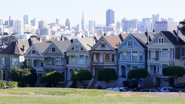 SAN FRANCISCO, USA - OCTOBER 5th, 2014: Painted Ladies with SF skyline in the background as seen from Alamo Square.