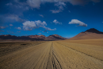 Desert and mountain over blue sky and white clouds on Altiplano,Bolivia Chile