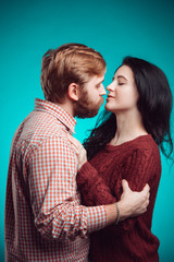 Young man and woman kissing