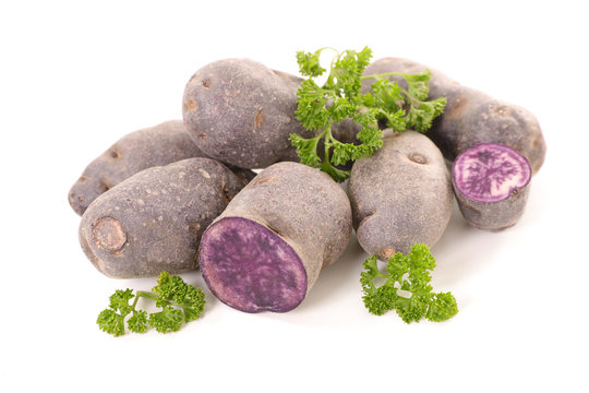 Raw Purple Potato Isolated On White