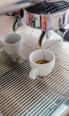 Fototapeta na wymiar Barista making a cup of coffee