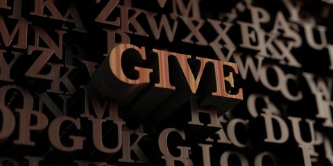 Give - Wooden 3D rendered letters/message.  Can be used for an online banner ad or a print postcard.